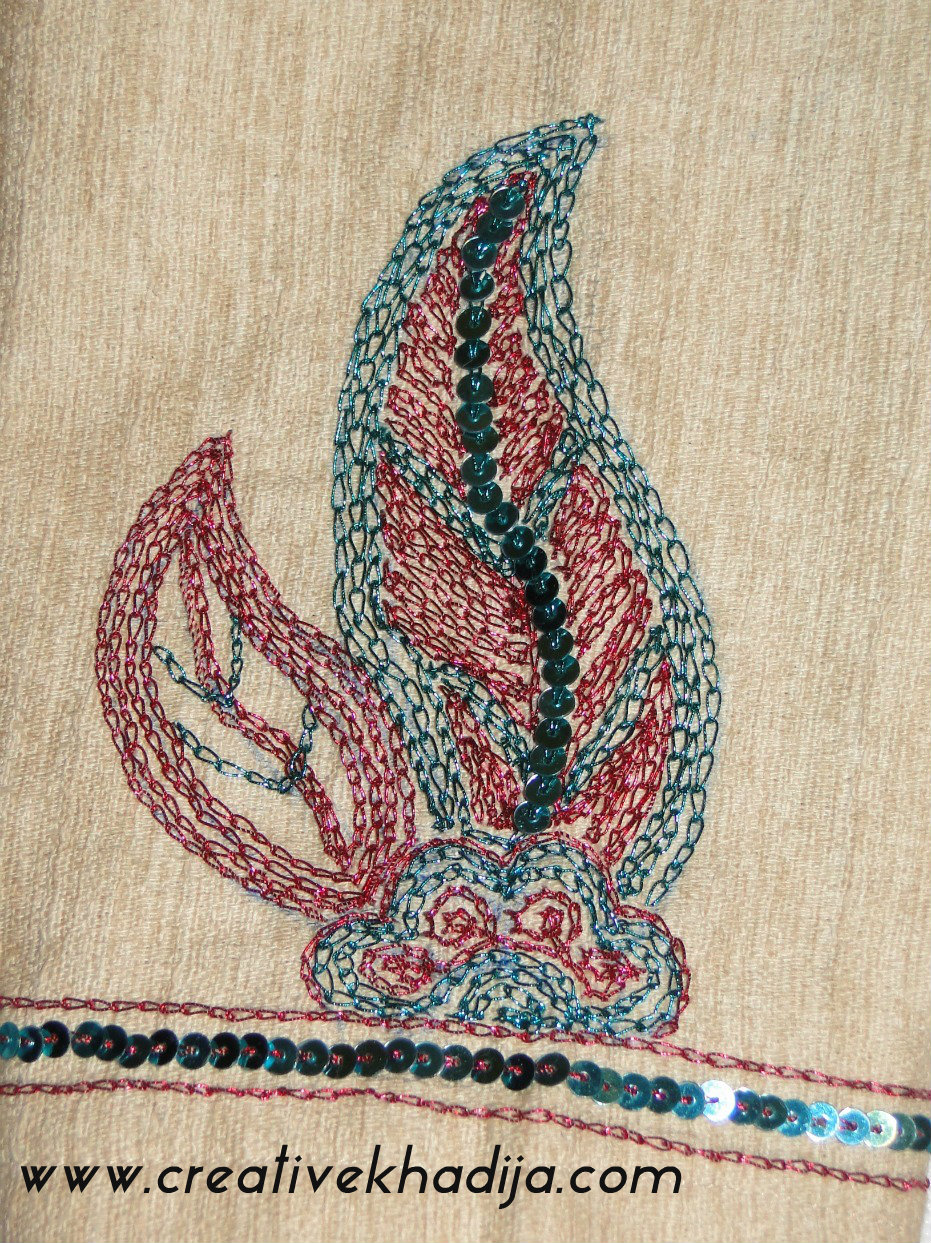 zardosi embroidery on shirt on arm