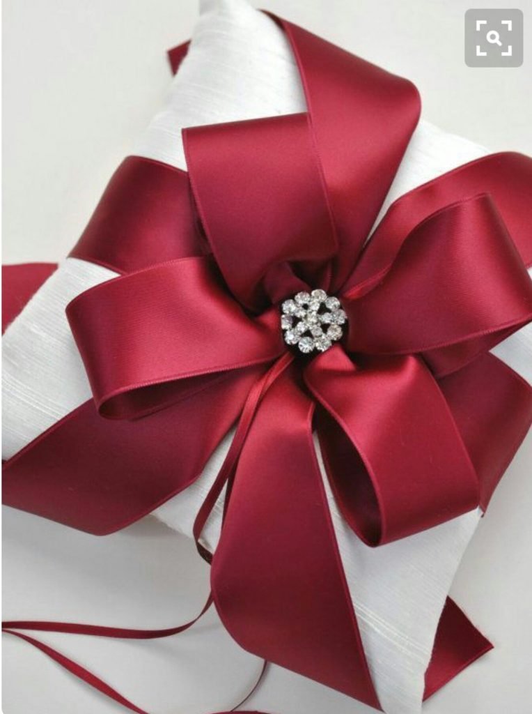 creative ideas for wrapping presents big maroon bow