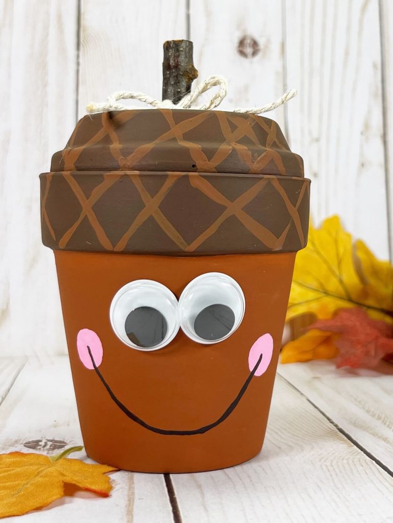 simple and easy fall crafts ideas plant pot acorn